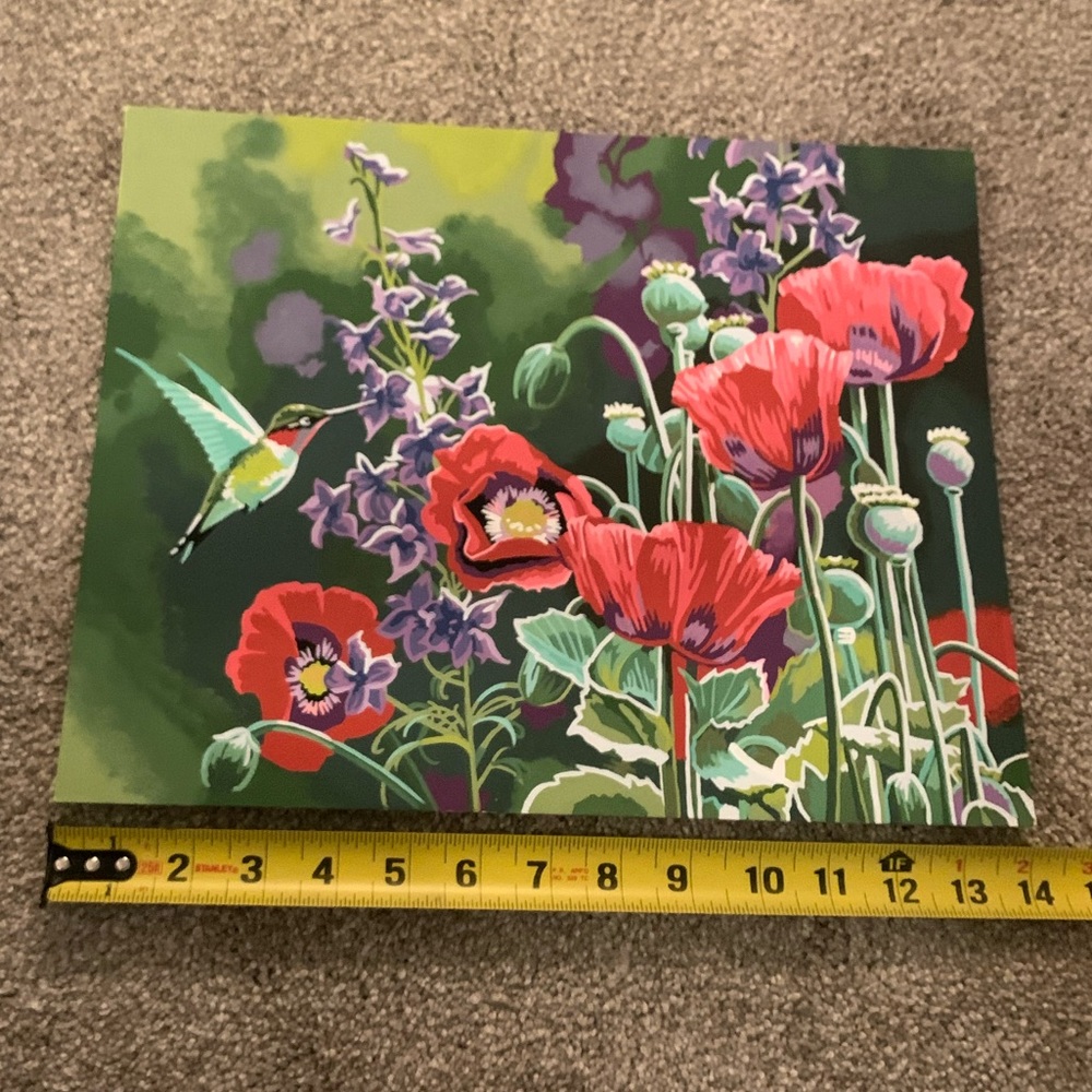 Hummingbird in peonies